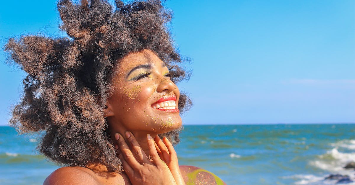 close-up-photo-of-woman-with-afro-hair