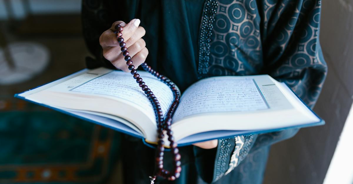 crop-photo-of-woman-holding-a-prayer-beads-and-holy-book-1