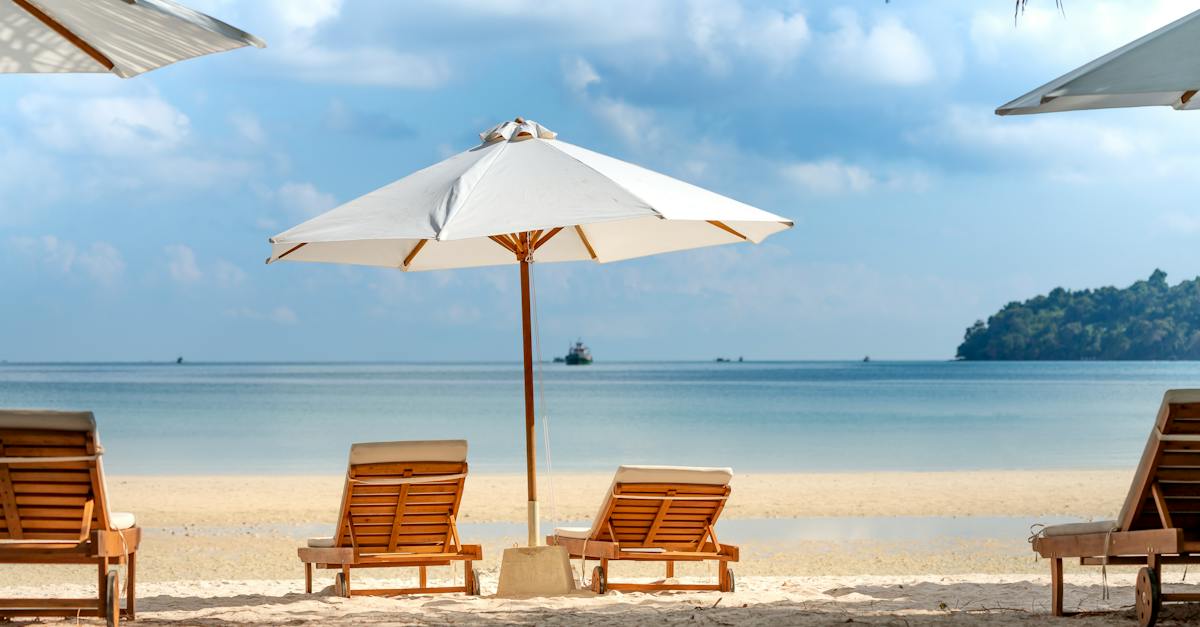 deckchairs-and-umbrellas-on-sandy-beach