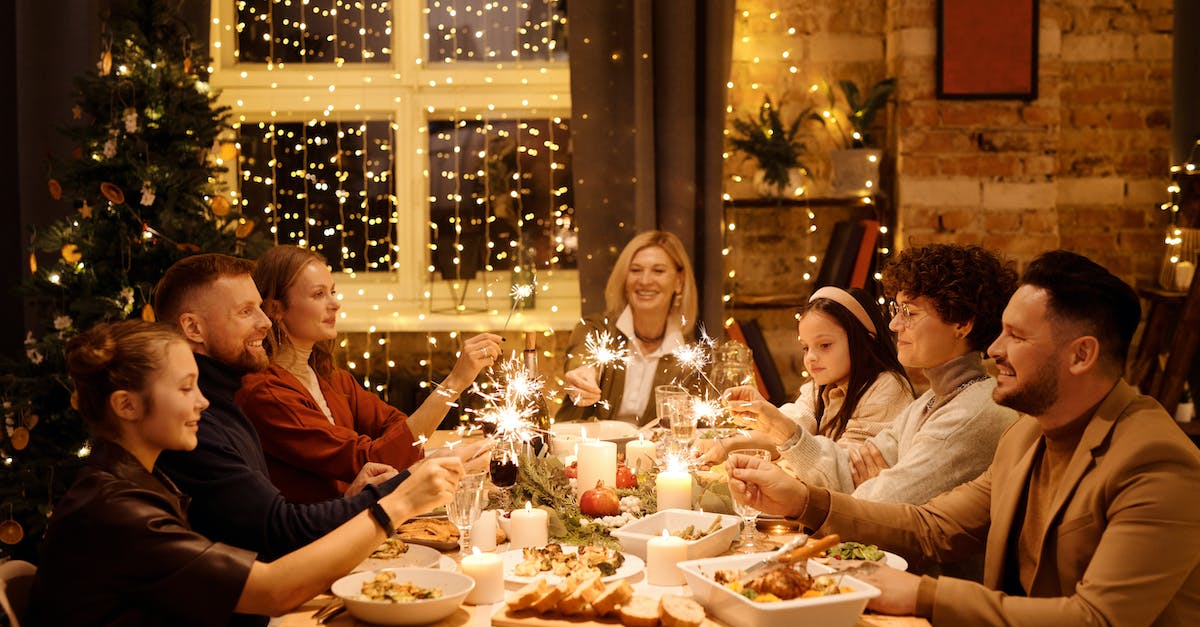 family-celebrating-christmas-while-holding-burning-sparklers-48