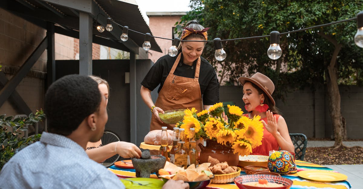 group-of-friends-eating-mexican-food