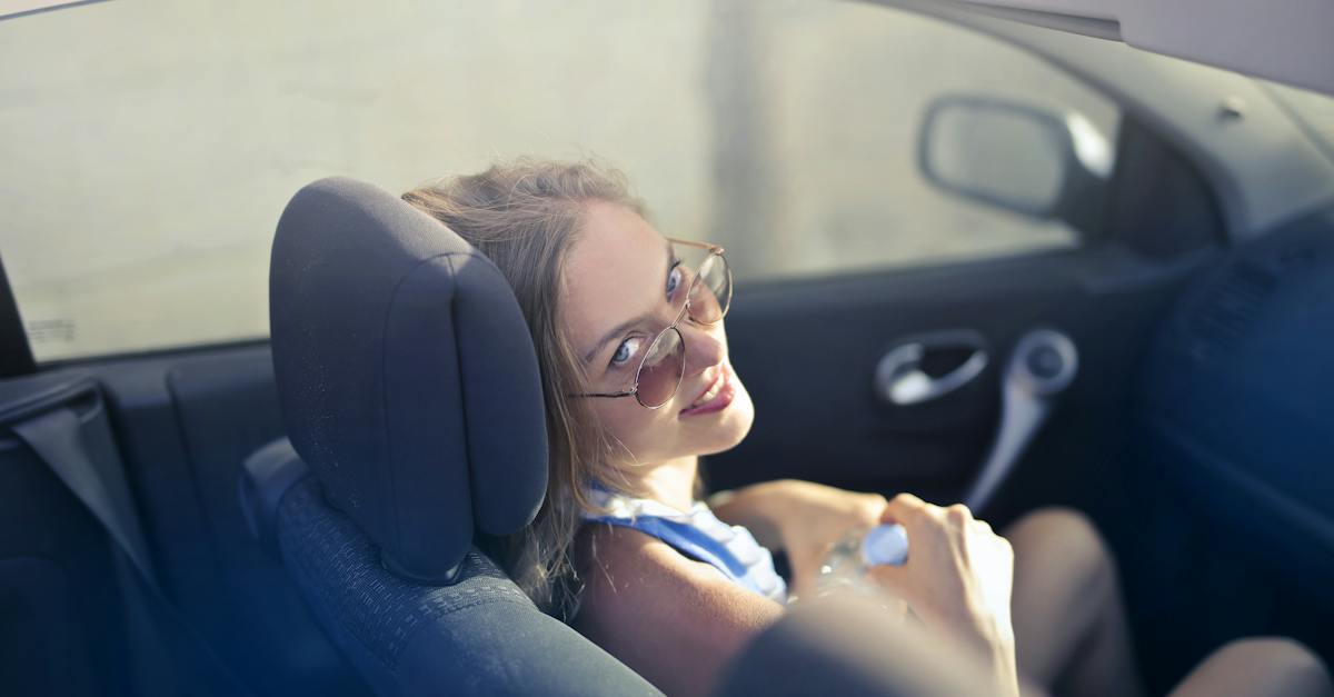 modern-woman-on-passenger-seat-in-convertible