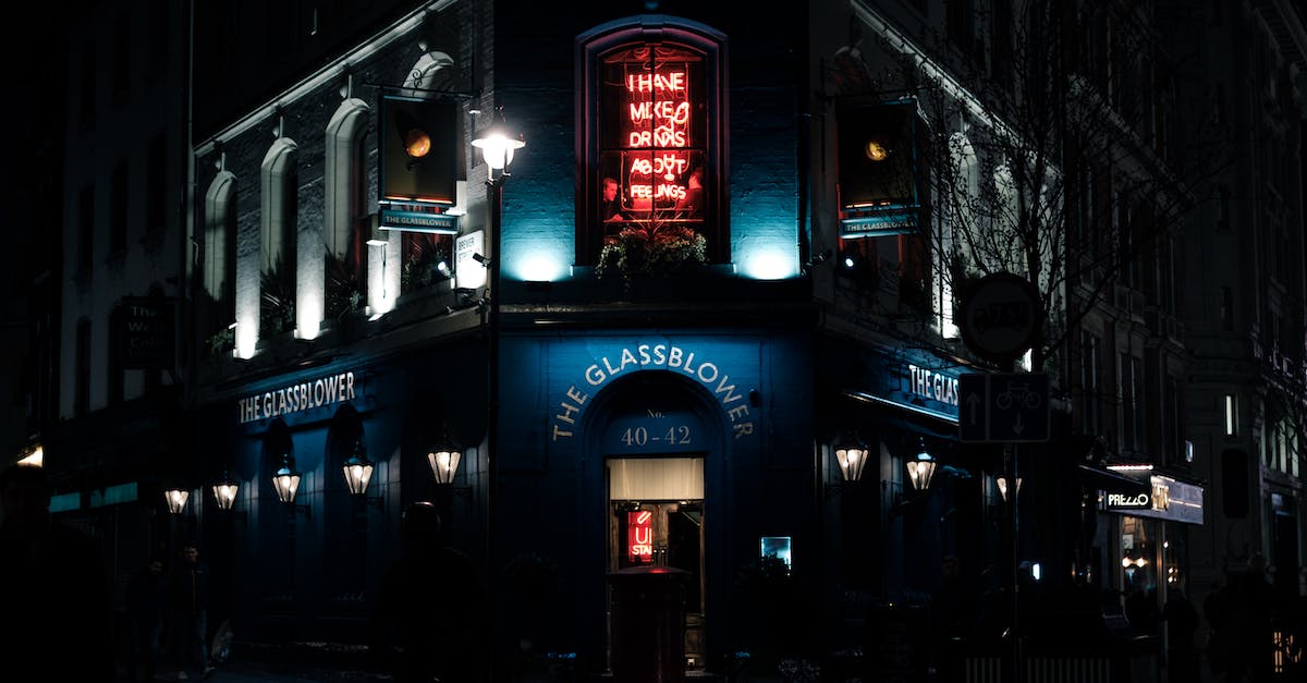 neon-sign-on-illuminated-building-at-night-1