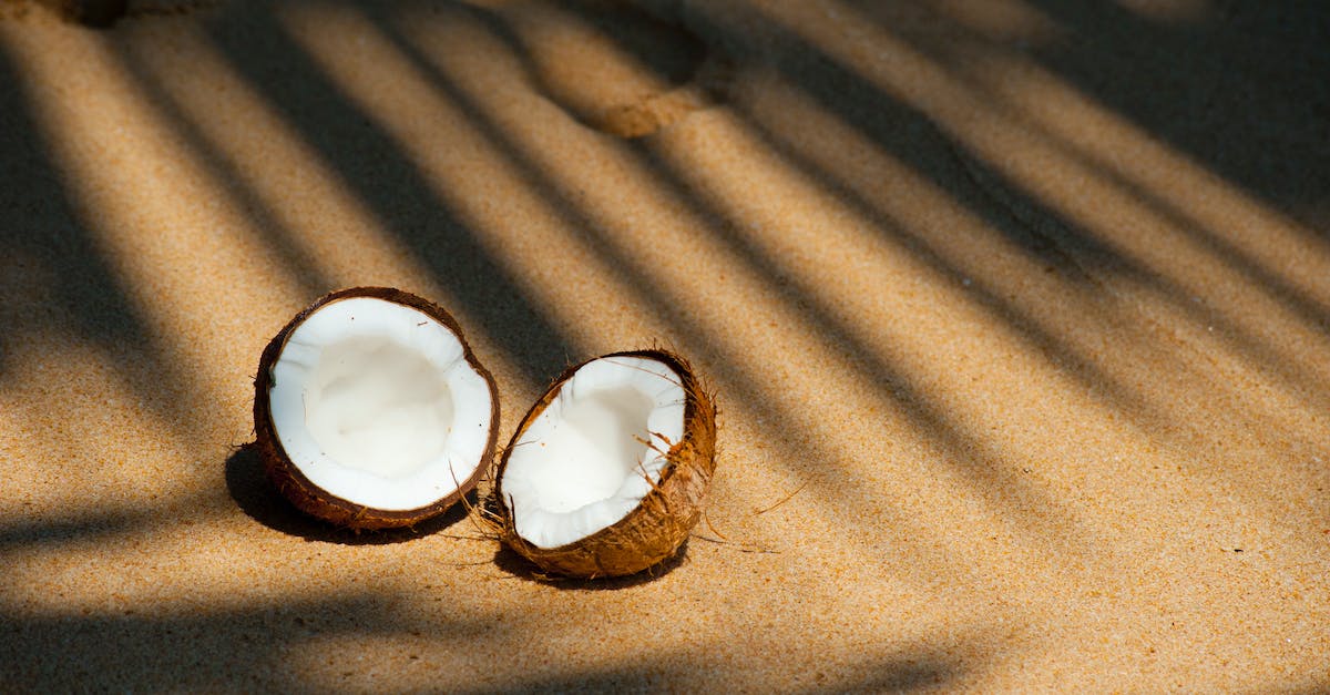 opened-coconut-on-sands-86