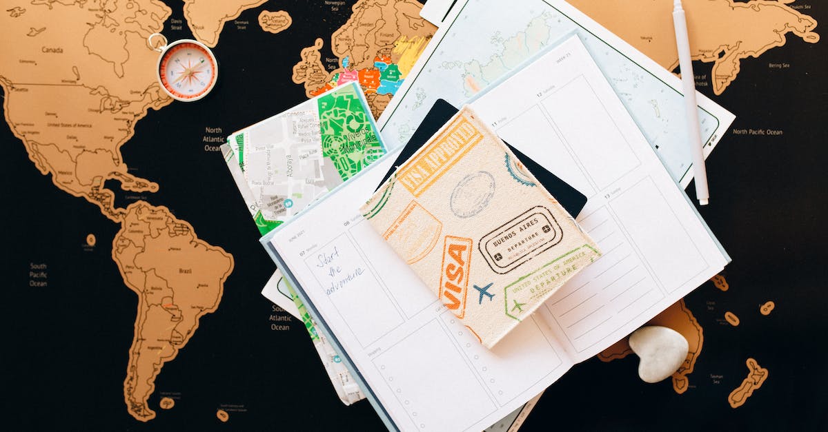 passport-on-top-of-a-planner