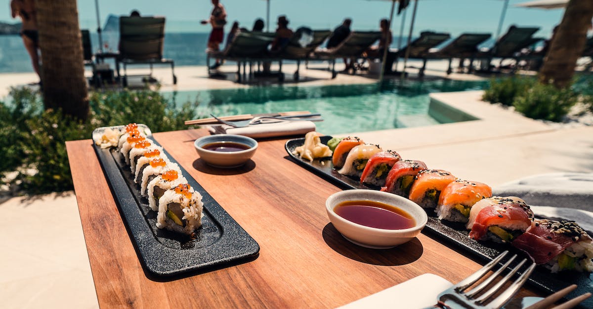 sushi-roll-on-tray-and-table